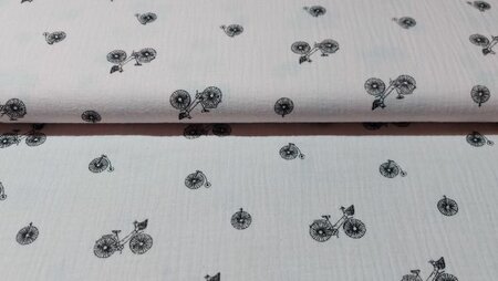 Katoenen mousseline in lichtroze met fietsjes