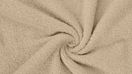 Taupekleurige badstof opgerold met zichtbare lusjes