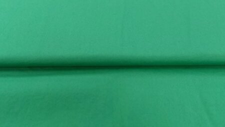 Effen groene stof met silicon finish en stretch in breedte