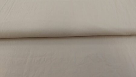 Zandkleurige katoenen poplin stof met stretch voor zelfmaakmode