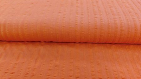 seersucker stof zalmroze close-up 135 cm katoen