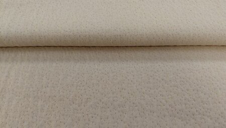 Beige ajour jacquard pointelle katoen stof close-up textuur