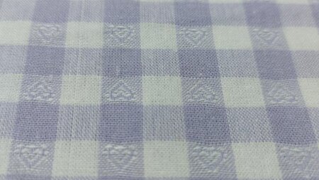 Geruit embroderie katoen met hartjes in lila en wit kopen