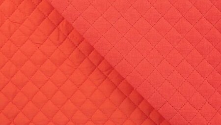 Koraalrode gewatteerde Bambino quiltstof close-up