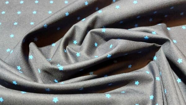 Stretch stof met sterrenmotief, ideaal voor kinderkleding, beschikbaar bij Stoffenland.com.