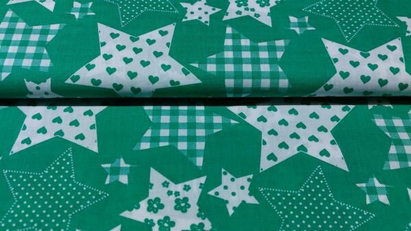 Groene katoenen stof met witte sterren, perfect voor kindermode
