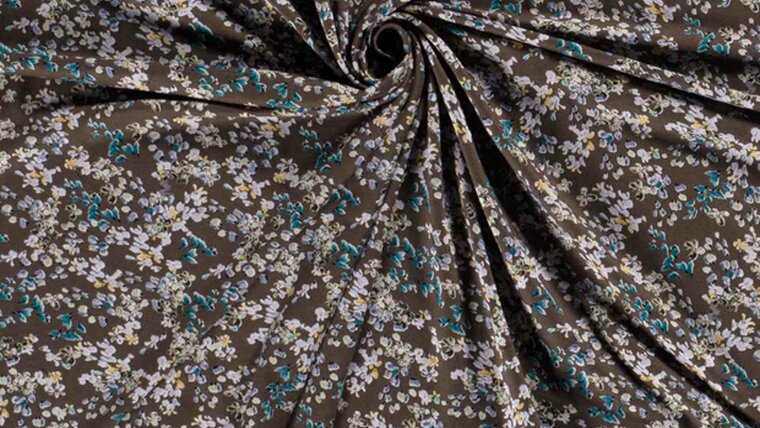 Modieuze en trendy grijze viscose tricot met bloemen kopen 