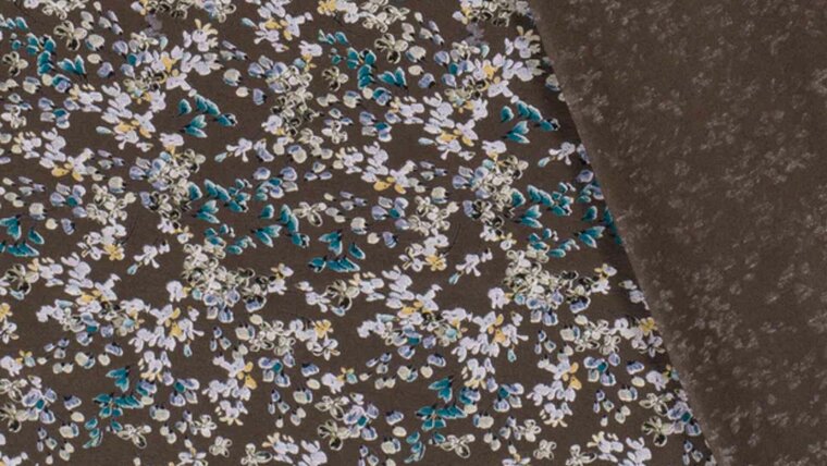 Mooie Modieuze en trendy grijze viscose tricot met bloemen bestellen