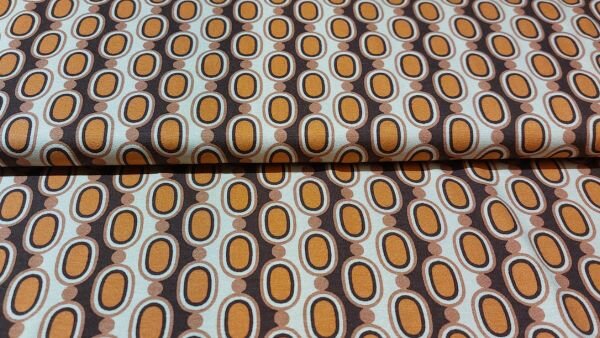 Naaien met Retroprint stretch viscose tricot stof in beige, oranje, bruin en karamel