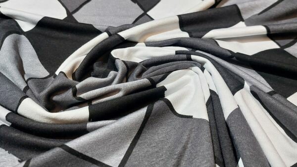 Bestel eenvoudig Zwart witte viscose tricot met stijlvolle ruiten