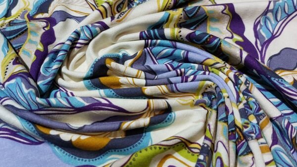 Trendy Ecru viscose tricot met trendy bladeren bestellen