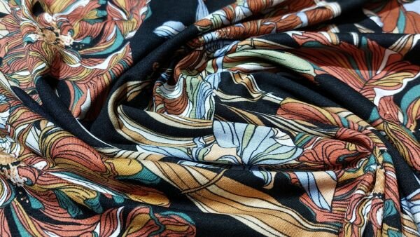 Bestel Zwarte viscose tricot met gekleurde bloemen