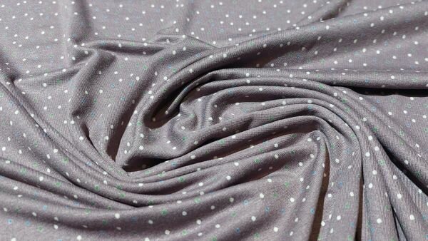 Naaien met Mauve ecru viscose tricot met stippen