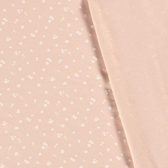 Katoen tricot stof met kleine witte bloemetjes ✂️ Licht roze