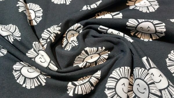Zwarte stretch katoen tricot met witte zonnetje voordelig bestellen