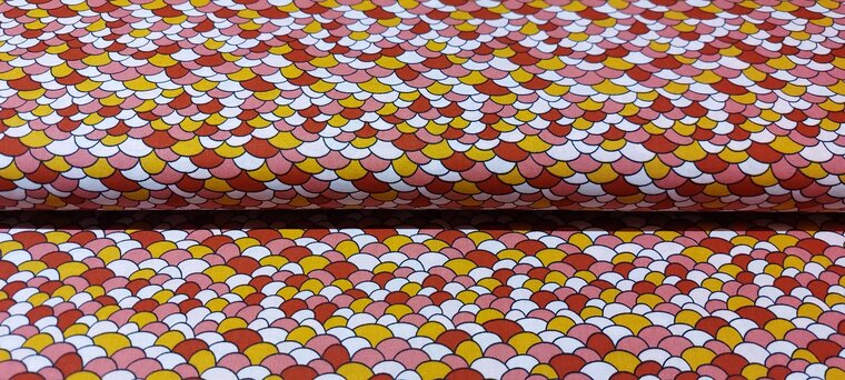Mooie katoenen stof met steentjesprint in roze, rood en okergeel