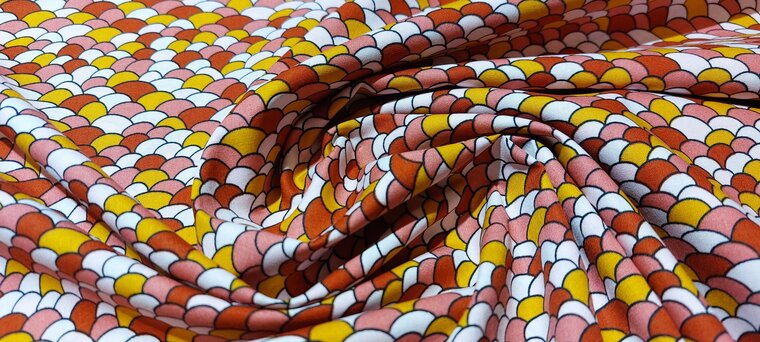 Detail katoenen stof met ovalen steentjes of eierenprint zonder stretch