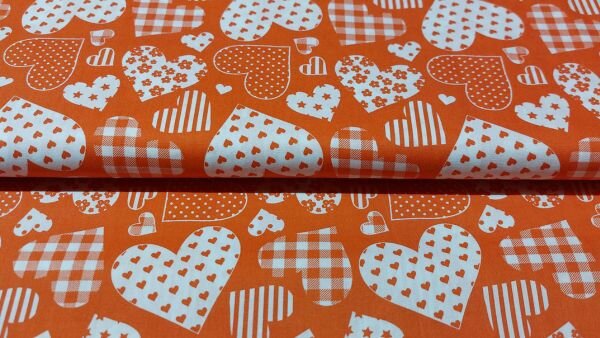 Oranje poplin katoen met witte hartjes &ndash; 100% katoenen stof