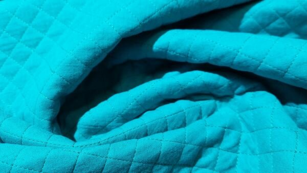 Bambino Quilt in de kleur petrol 