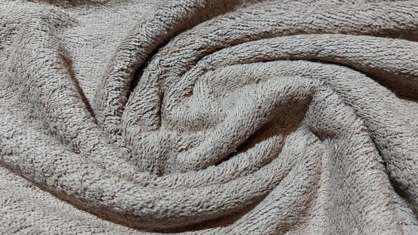 Donker beige badstof van 100% katoen close-up