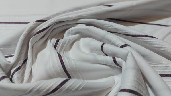 Close-up katoenen stof met embroiderie strepen