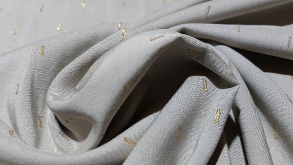 valling van goudkleurig lurex in viscose stof	