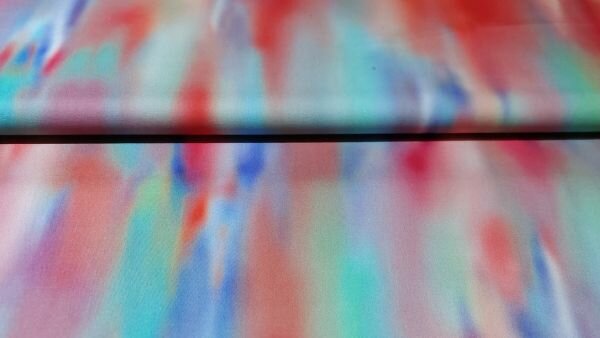 Stretchy broekenstof tie-dye roze blauw groen