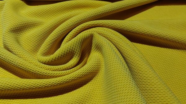 stretch tricot piqu&eacute; oker