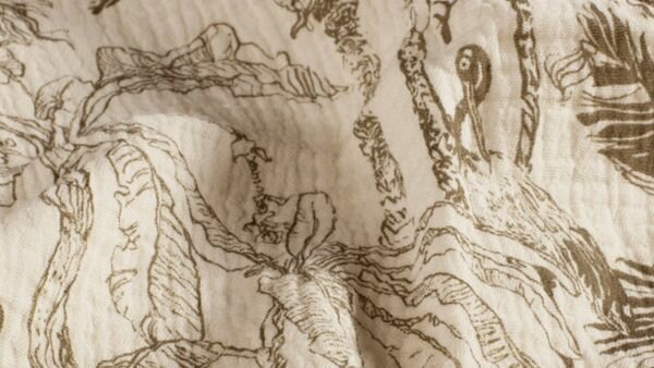 Taupegrijze mousseline stof met jungleprint detail