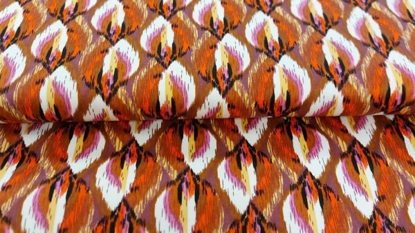 stretchkatoen ikat print rood bruin roze