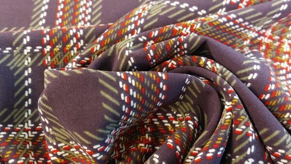 stretch stof met ruitmotief oker rood wit