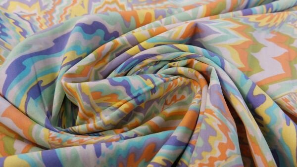 Modern paisley dusty mint stof in zalm, blauw, geel, groen en paars
