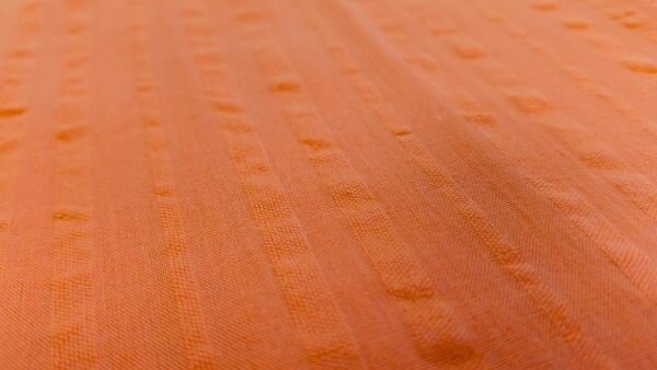 chalk cotton seersucker stof zalm roze patroonstructuur