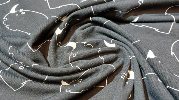 Bestel voordelig Zwarte stretch katoen tricot met witte, abstracte neushoorns