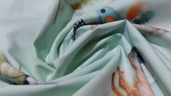 Katoenen stof mint groen met dierenprint