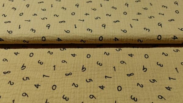Okergele katoenen mousseline stof met cijfers