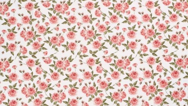 roze rozen op witte achtergrond stof