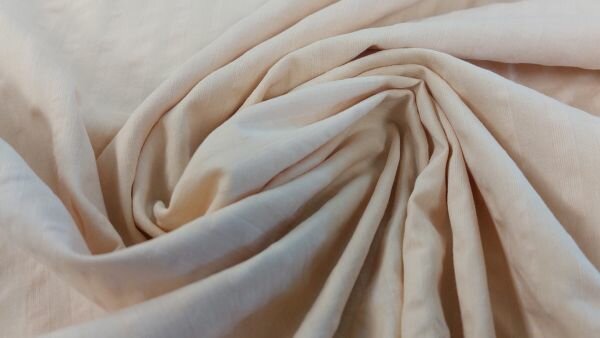 Chalk cotton seersucker stof lichtgeel close-up gebobbelde structuur