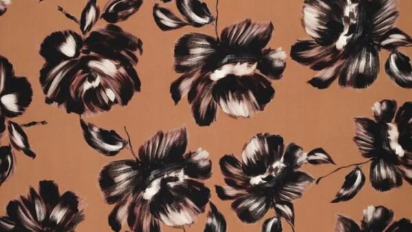 Bruine viscose jersey stof met pioenbloem print;