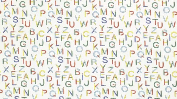 Witte stof met kleurrijke letters close-up