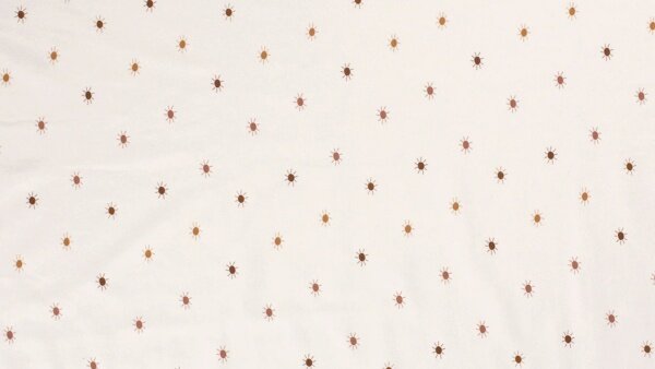 Close-up gebroken wit tricot met zonnen motief 200 g/m&sup2;