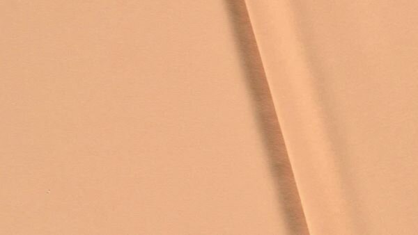 zachte perzik kleur stretch stof