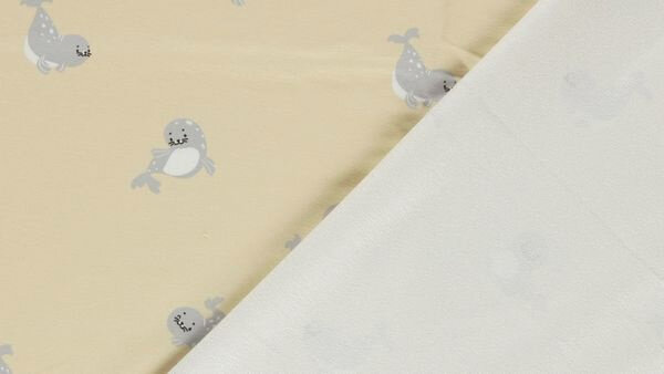 Beige stof met zeehonden