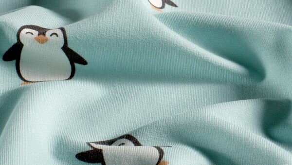 Katoenen stof met schattige pingu&iuml;nprint
