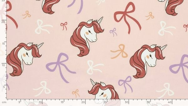 Roze eenhoornstof voor kinderkleding