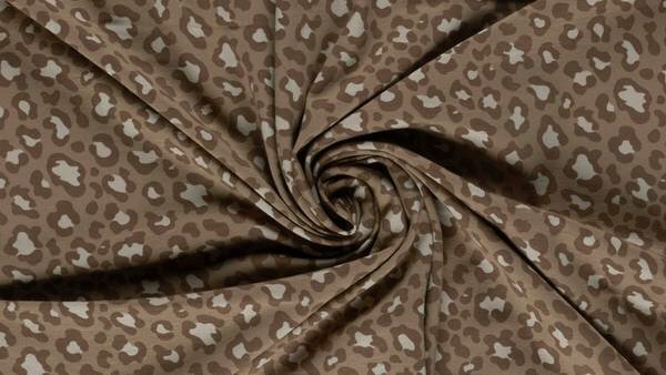 Bruine tricot stof met luipaardprint