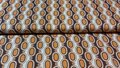 Naaien met Retroprint stretch viscose tricot stof in beige, oranje, bruin en karamel