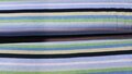 Gestreepte tricot stof (Zwart, paars, lila, groen, zand)
